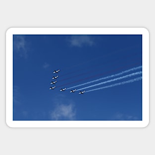 Squadron of seven aircraft against blue sky Sticker